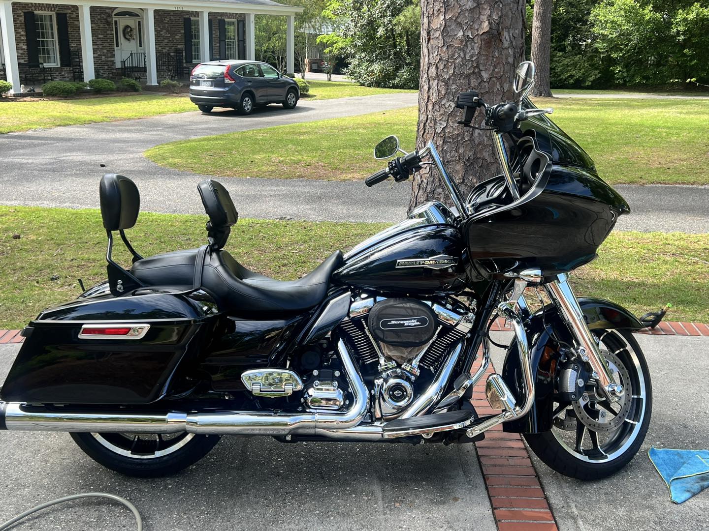 Detailed black Harley-Davidson motorcycle after mobile detailing